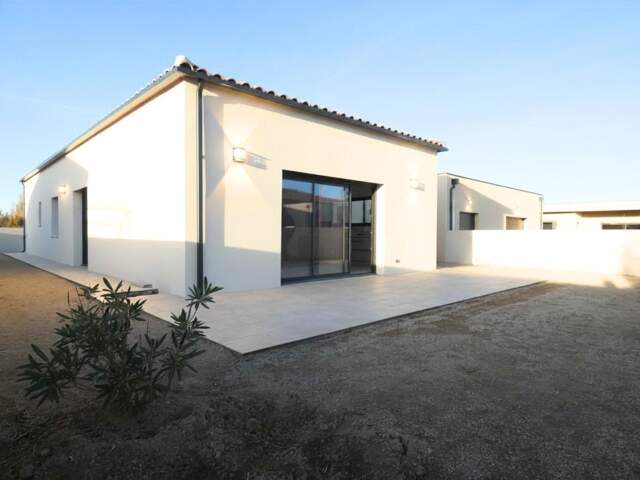 Villa plain pied 115m² sur terrain de 400m² avec grand garage — photo du bien
