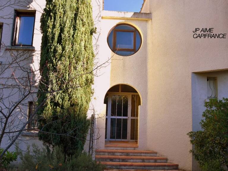 Dpt Gard (30), à vendre BAGNOLS SUR CEZE maison d'architecte de 200 m² avec piscine couverte et aménagements indépendants pour profession libérale.- Terrain de 1 268,00 m² — photo 1