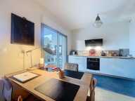 Appartement À Vendre en rez de jardin proche centre ville dans résidence avec ascenseur — photo 2