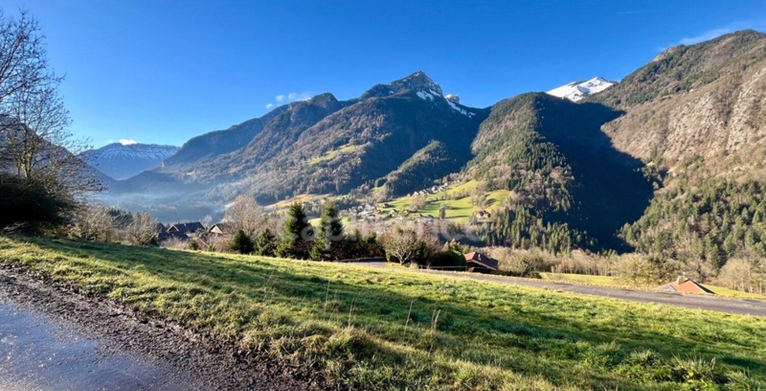 A vendre : Terrain d’Exception de 1530 m² – Vue Panoramique – Petit-Bornand-les-Glières (74) — photo 1