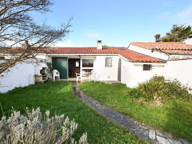 Maison plain-pied - jardin - stationnement — photo du bien