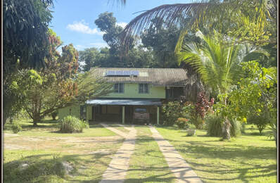 A VENDRE A KOUROU UNE CHARMANTE MAISON T5 EN BOIS DE 133 m² SUPERFICIE TERRAIN 2 HECTARES - AU PRIX DE 346 500 € — photo du bien
