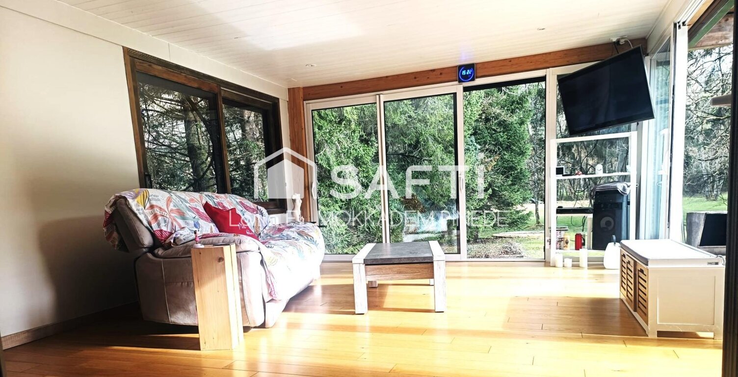 Maison plain pied avec grand terrain et rivière — photo 1