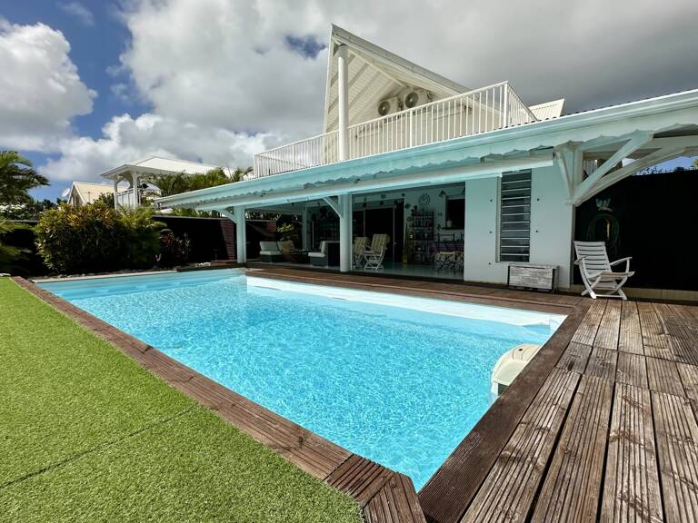   Saint-François : Villa de Prestige avec Vue Panoramique sur la Mer L’ART DE VIVRE SOUS LES ALIZÉS – UNE DEMEURE D'EXCEPTION DE 252 m² — photo 1