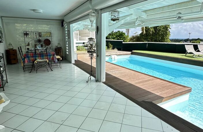 ? Saint-François : Villa de Prestige avec Vue Panoramique sur la Mer L’ART DE VIVRE SOUS LES ALIZÉS – UNE DEMEURE D'EXCEPTION DE 252 m² — photo 2