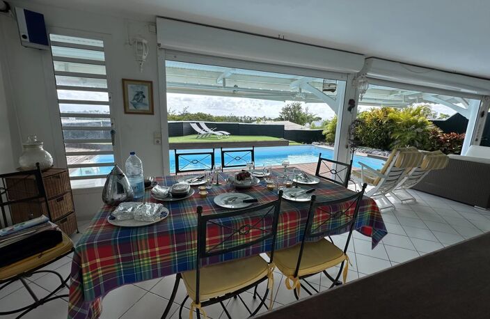 ? Saint-François : Villa de Prestige avec Vue Panoramique sur la Mer L’ART DE VIVRE SOUS LES ALIZÉS – UNE DEMEURE D'EXCEPTION DE 252 m² — photo 4