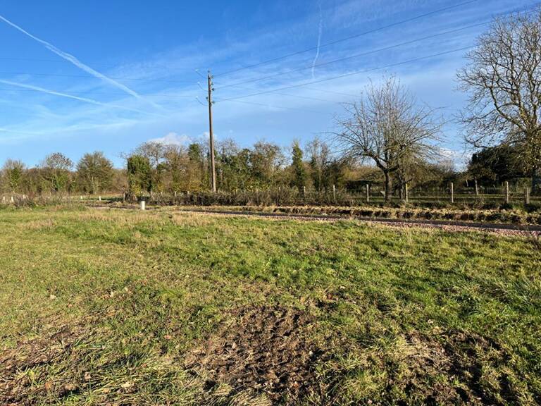 NORON L'ABBAYE TERRAIN VIABILISE DE 696 m² — photo 1