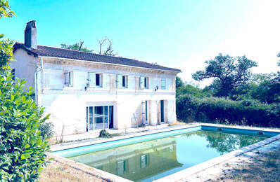 A VENDRE MAISON EN PIERRE AVEC TERRAIN ET ETANG - SECTEUR COUTRAS — photo du bien