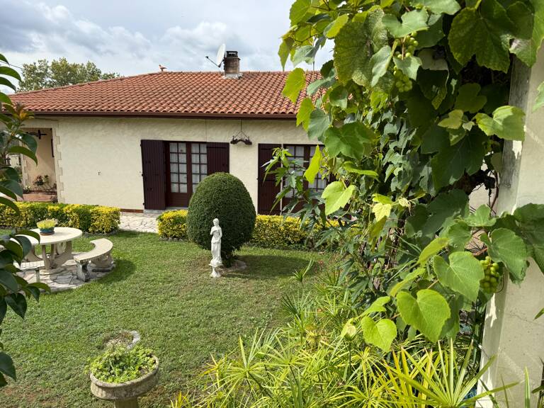 Maison T4 avec garage et jardin — photo 1