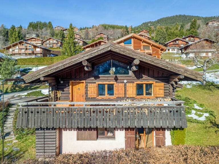 Chalet avec vue et terrain de 131 m2 à LA CLUSAZ (74) — photo 1
