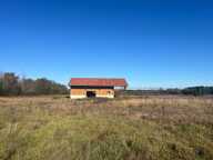 Vaste terrain constructible à vendre avec dépendance neuve — photo 4