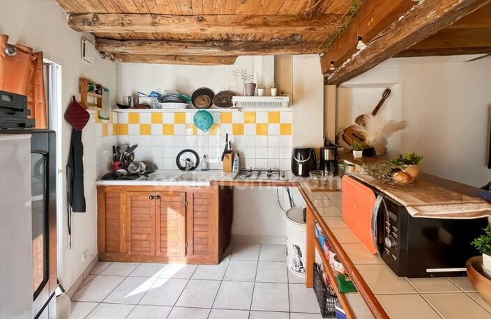 CHARMANTE MAISON DE VILLAGE LOUEE A MEZIN 111 M² 4 PIECES — photo 3