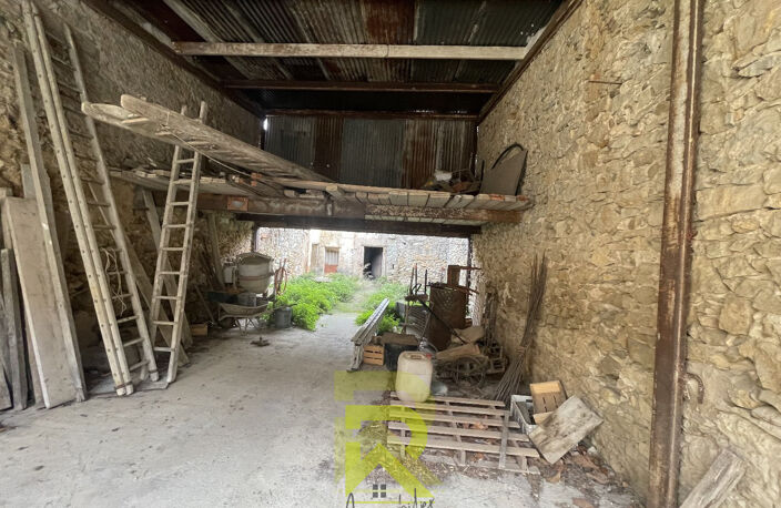 Bâtiment en pierre de 120 m2 avec jardin de 102 m2 — photo 2