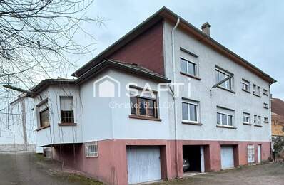 Immeuble composé de 2 appartements et une celleule commerciale. — photo du bien