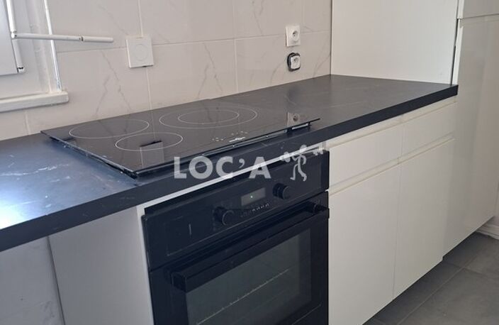 Location appartement 4 pièces 74 m² à Rillieux-la-Pape (69140) — photo 2