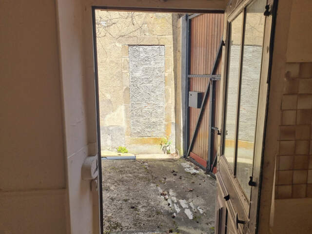 Maison de ville avec local commercial ! — photo du bien