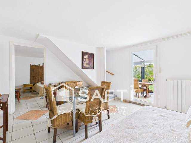 Séjour traversant de 53m2, 4 chambres, garage, jardin — photo du bien