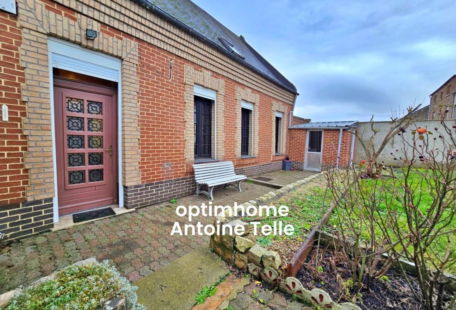 Le Cateau - Maison semi-individuelle à double accès avec garage, devanture & jardin clos sur 960m² — photo 1