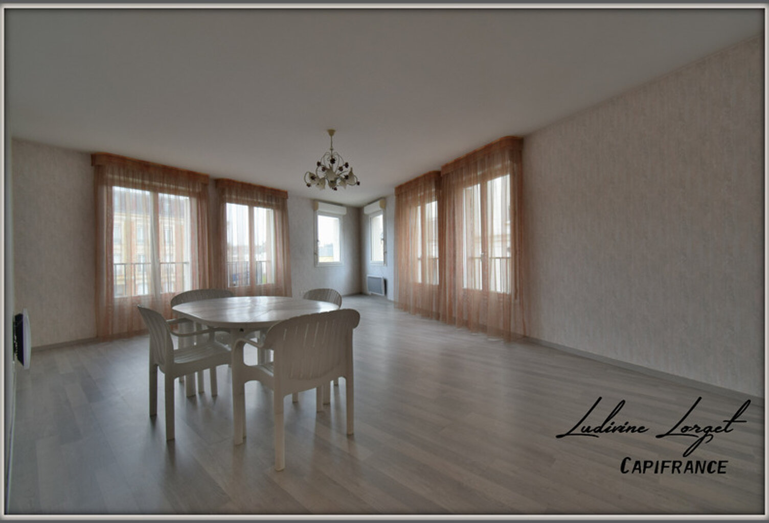 Appartement à vendre 5 pièces CHATEAU-THIERRY (02) Centre ville – 103m2 – 3 chambres – 1 place de parking sous-sol – vue sur la Marne — photo 1