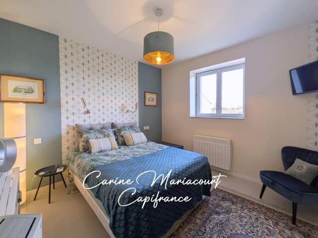Maison de caractère de 226 m2, DPE B, 4 suites parentales, 2 garages, grande cave aménageable — photo du bien