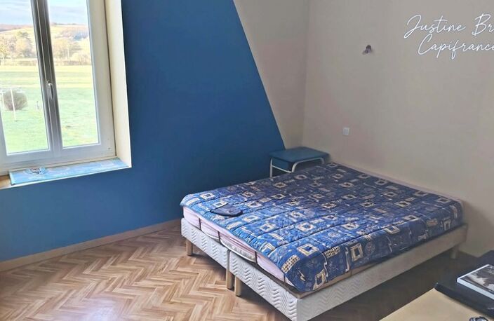 Une maison familiale aux beaux volumes, au cœur d’un village où il fait bon vivre — photo 4