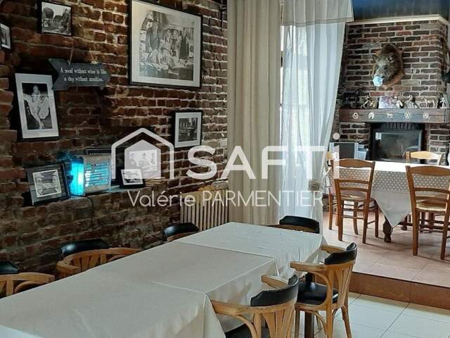 Immeuble mixte avec restaurant exploité, logement indépendant et fort potentiel de développement — photo du bien