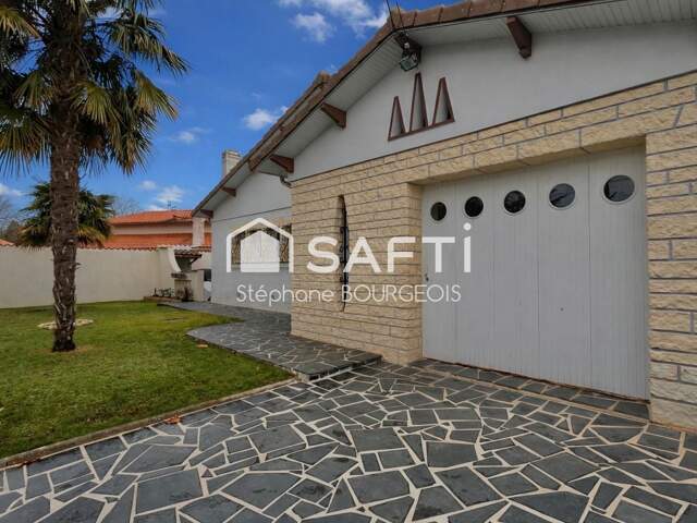 À Saujon, maison de plain-pied de 87 m2 sur parcelle de 510 m2, garage — photo du bien