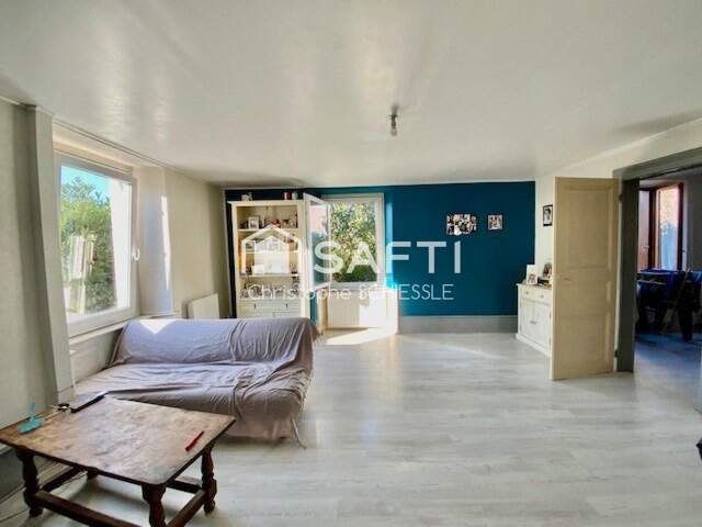 Immeuble de 3 appartements avec un garage et deux caves sur 3 ares 58 — photo du bien