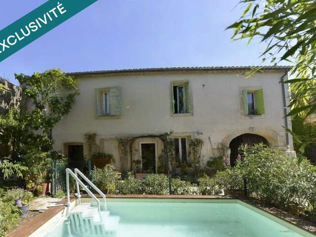 Maison de village de 182m² avec piscine, 4 chambres, garages. — photo du bien