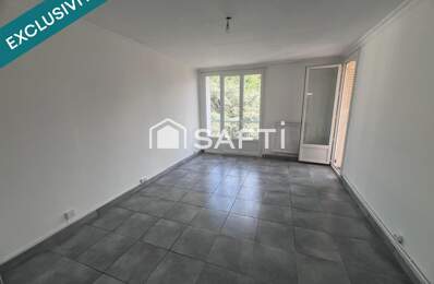 Appartement T3 de 59 m² avec balcon, ascenseur et cave — photo du bien