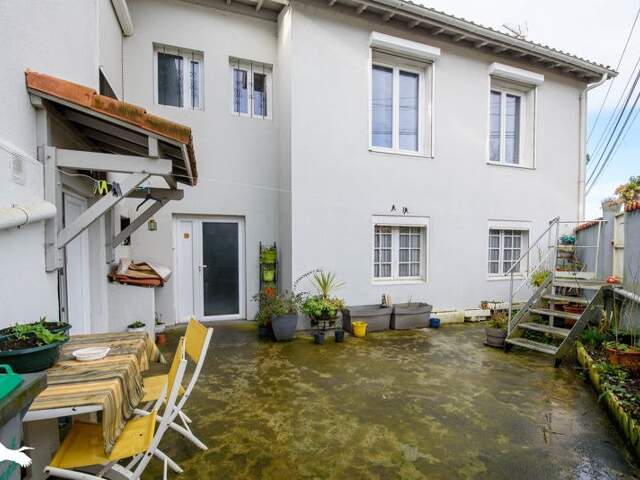 Maison de ville de 8 pièces principales — photo du bien