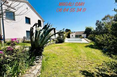 Maison 7 pièces 499000 €