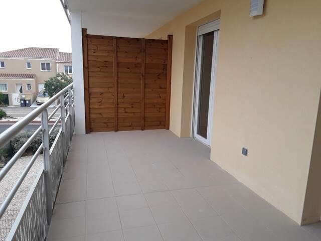 Opportunité à Théza – T2 avec grand balcon et parking — photo du bien