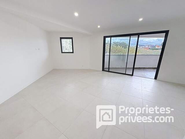 Grand T2 de 54 m², + box de 15 m² dans petite résidence calme — photo du bien