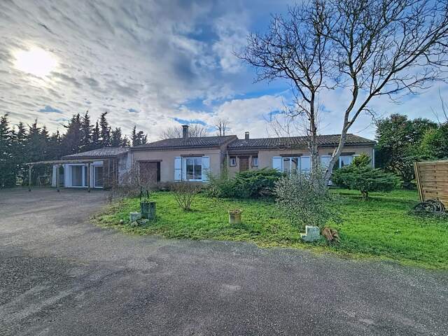 Maison de plain-pied avec dépendances  Villeneuve-la-Comptal  Idéale artisan ou projet évolutif — photo du bien