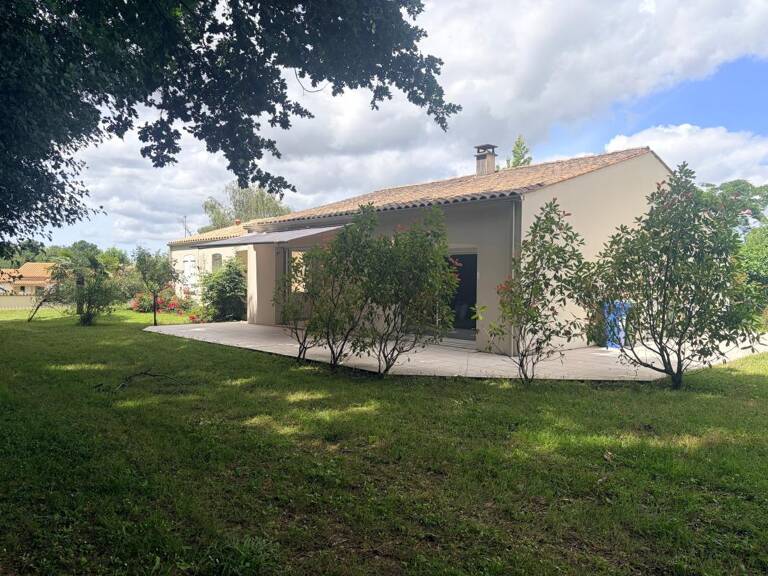 Maison lumineuse avec patio et environnement verdoyant — photo 1
