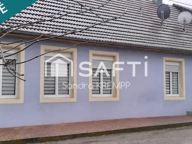 Maison mitoyenne de 4 pièces et terrain constructible — photo du bien