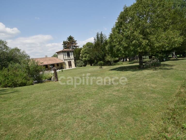 Demeure en pierre du XVIIIe siècle - poutres apparentes - 3 chambres - 2 boxes à chevaux - 18 000m2 de terrain - proche de MARMANDE (47) — photo 1