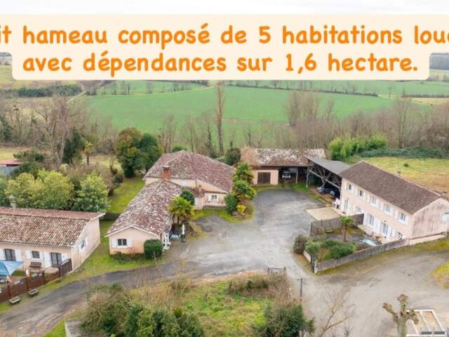 Hameau composé de 5 habitations avec garage et dépendance sur 16000m² de terrain. — photo du bien
