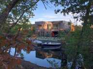 CAZAUX (33260) – MAISON CONTEMPORAINE – 5 SUITES PARENTALES – PISCINE – PROPRIÉTÉ DU CANAL – SANS VIS-À-VIS – GARAGE — photo 4