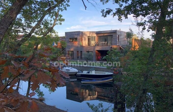 CAZAUX (33260) – MAISON CONTEMPORAINE – 5 SUITES PARENTALES – PISCINE – PROPRIÉTÉ DU CANAL – SANS VIS-À-VIS – GARAGE — photo 4