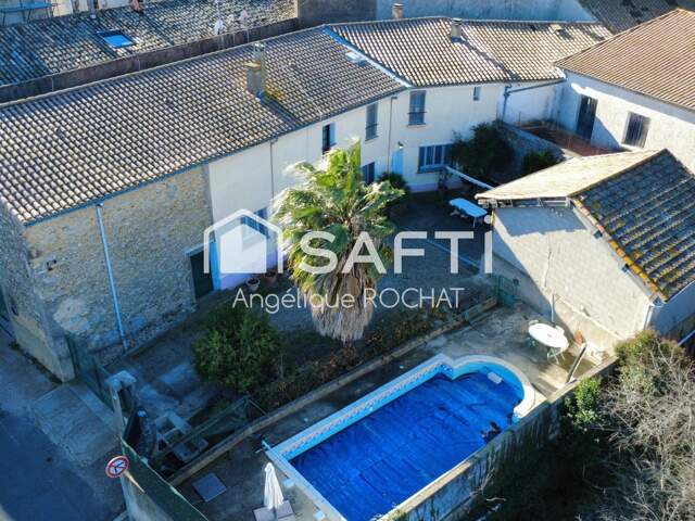 Grande bâtisse + 500m2 garage 190m2 + grenier 150m2  au centre de Magalas — photo du bien
