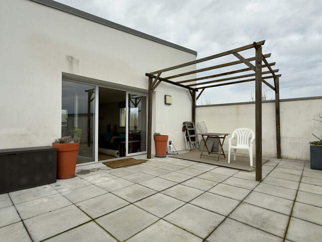 Appartement type 5 en duplex - terrasse et stationnements — photo du bien