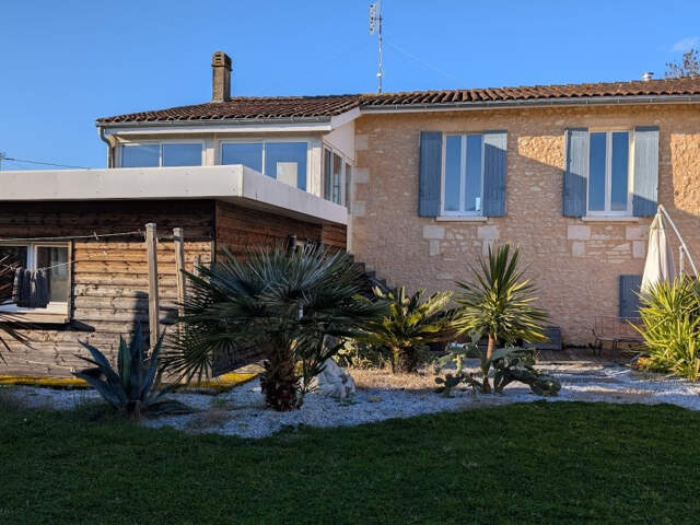 MAISON EN PIERRE -150 m2 - 3 Chambres - REIGNAC — photo du bien