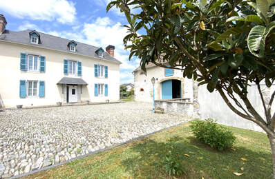 PLAINE DE NAY  : ancien corps de ferme rénové avec sa grange de 120 m² — photo du bien