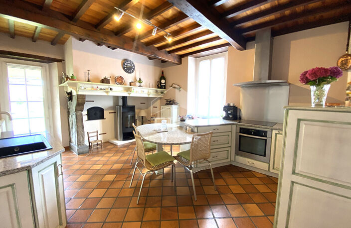 PLAINE DE NAY  : ancien corps de ferme rénové avec sa grange de 120 m² — photo 3