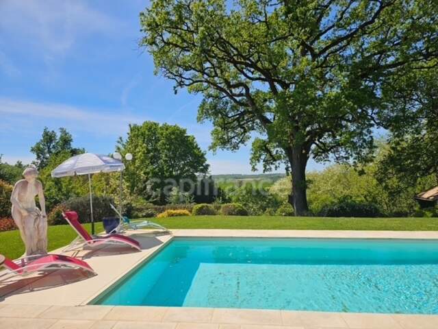Villa de plain pied - 4 chambres - piscine - terrain de pétanque - garage - cadre naturel privilégié — photo du bien