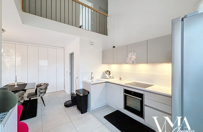 Duplex T5 de standing en hypercentre. — photo 3