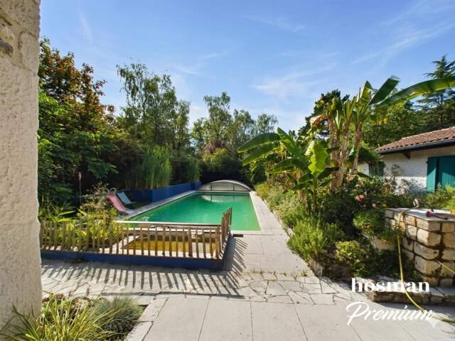 Maison de 235 m² avec piscine sur un terrain de 10 715m² et accès privé à l'Erdre - Sucé-sur-Erdre — photo du bien