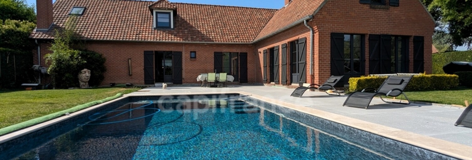 Maison 7 Pièces 217 m² à vendre à Halluin (59250)